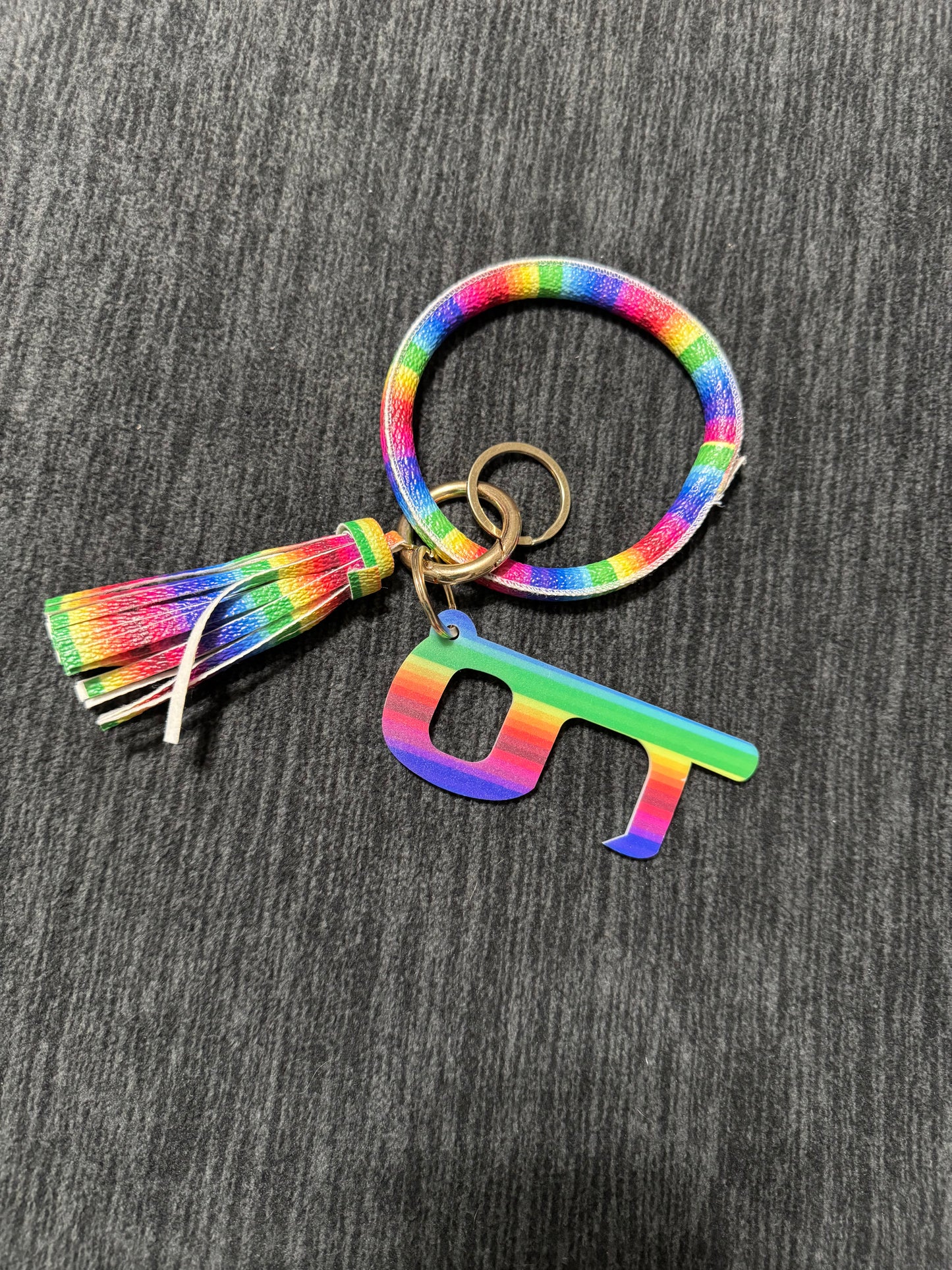 Wristlet with keychain and no touch door opener